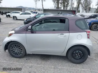 2014 Scion iQ with VIN JTNJJXB01EJ028930, listed as a IAAI auction lot 41771879 with 113,364 mi miles. Bid and sale history available at carsss.com. Image 14.