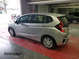 2016 Honda Fit LX with VIN JHMGK5H50GX005947, listed as a Copart auction lot 57699275 with 103,698 mi miles and Salvage title. Bid and sale history available at DreamBid. Image 2.