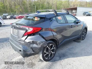 2019 Toyota C-HR XLE z VIN JTNKHMBX0K1013522, wystawiony jako IAAI lot #42053511 z przebiegiem 136 330 mil mil oraz . Historia ofert i sprzedaży dostępna na DreamBid. Obrazek 4.