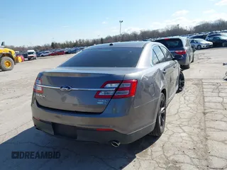 2013 Ford Taurus SEL z VIN 1FAHP2H83DG231000, wystawiony jako IAAI lot #41986420 z przebiegiem 200 390 mil mil oraz . Historia ofert i sprzedaży dostępna na DreamBid. Obrazek 4.