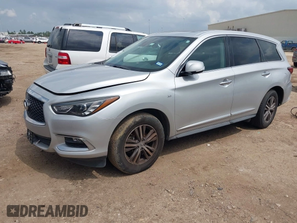 2019 Infiniti QX60 Luxe with VIN 5N1DL0MN0KC511333, listed as a IAAI auction lot 42070088 with 117,796 mi miles and . Bid and sale history available at DreamBid. Image 17.