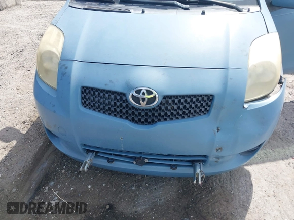 2007 Toyota Yaris z VIN JTDJT923675101502, wystawiony jako IAAI lot #42094488 z przebiegiem 127 971 mil mil oraz . Historia ofert i sprzedaży dostępna na DreamBid. Obrazek 13.