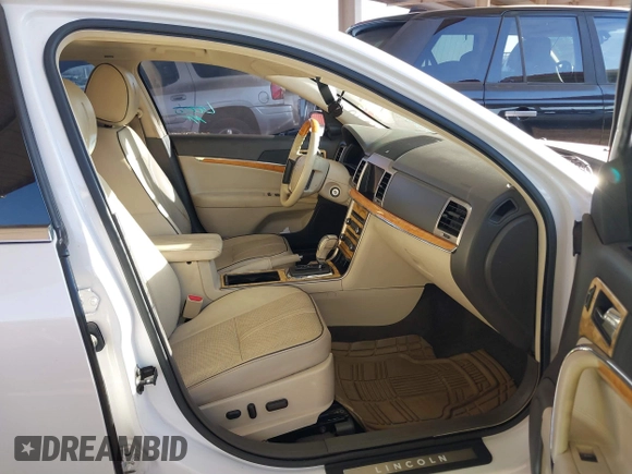 2012 Lincoln MKZ Hybrid with VIN 3LNDL2L36CR837071, listed as a IAAI auction lot 40582663 with 117,272 mi miles and . Bid and sale history available at DreamBid. Image 5.