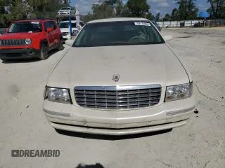 1999 Cadillac DeVille z VIN 1G6KD54YXXU794473, wystawiony jako Copart lot #79774804 z przebiegiem 44 601 mil mil oraz Czysty tytuł • Clean title. Historia ofert i sprzedaży dostępna na DreamBid. Obrazek 5.