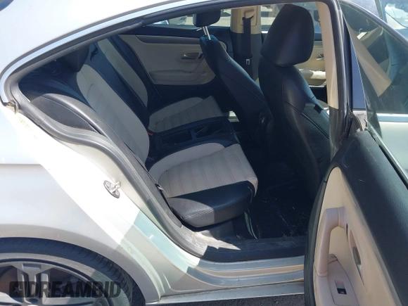 2011 Volkswagen CC Sport with VIN WVWMP7AN9BE705823, listed as a IAAI auction lot 41994900 with 141,382 mi miles and . Bid and sale history available at DreamBid. Image 8.