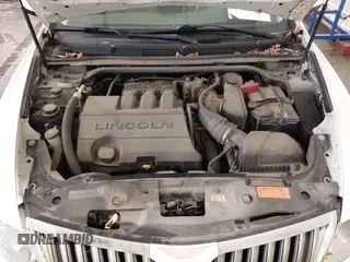 2012 Lincoln MKS with VIN 1LNHL9ER2CG803230, listed as a IAAI auction lot 41734620 with 66,585 mi miles. Bid and sale history available at carsss.com. Image 10.