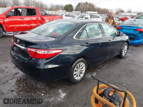 2015 Toyota Camry XLE with VIN 4T1BF1FK4FU043212, listed as a IAAI auction lot 41706573 with 170,074 mi miles and . Bid and sale history available at DreamBid. Image 4.