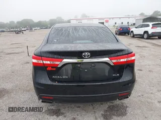 2014 Toyota Avalon Limited z VIN 4T1BK1EB3EU132555, wystawiony jako IAAI lot #41883284 z przebiegiem 263 238 mil mil oraz . Historia ofert i sprzedaży dostępna na DreamBid. Obrazek 16.