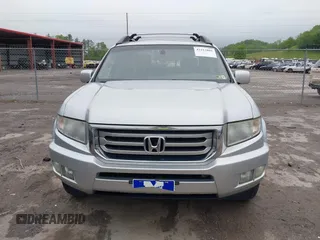 2012 Honda Ridgeline RTL with VIN 5FPYK1F58CB454385, listed as a IAAI auction lot 42212805 with 207,874 mi miles and . Bid and sale history available at DreamBid. Image 12.