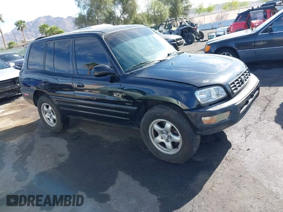 1999 Toyota RAV4 with VIN JT3GP10V9X7058125, listed as a IAAI auction lot 42056633 with 247,015 mi miles and . Bid and sale history available at DreamBid. Image 1.