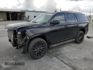 2023 Cadillac Escalade 4WD Premium Luxury z VIN 1GYS4BKL5PR388049, wystawiony jako Copart lot #54626395 z przebiegiem 28 152 mil mil oraz Szkoda całkowita • Salvage title. Historia ofert i sprzedaży dostępna na DreamBid. Obrazek 1.