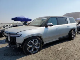 2024 Rivian R1S Adventure with VIN 7PDSGBBA7RN044642, listed as a Copart auction lot 62567904 with 1,888 mi miles and Salvage Title. Bid and sale history available at carsss.com. Image 1.