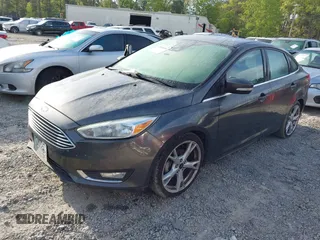 2016 Ford Focus Titanium with VIN 1FADP3J25GL282293, listed as a IAAI auction lot 41998959 with 119,781 mi miles and . Bid and sale history available at DreamBid. Image 17.
