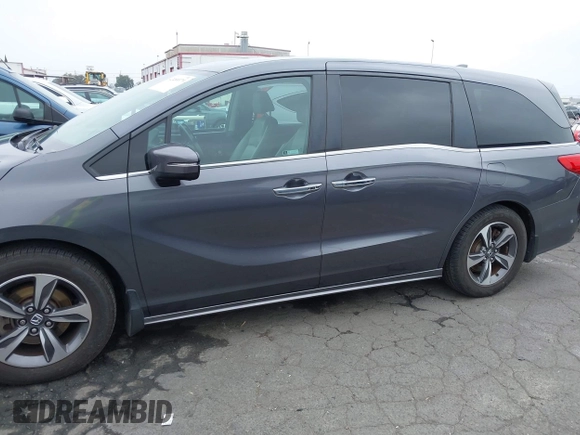 2018 Honda Odyssey Touring with VIN 5FNRL6H88JB062213, listed as a IAAI auction lot 42489379 with 90,578 mi miles and . Bid and sale history available at DreamBid. Image 15.