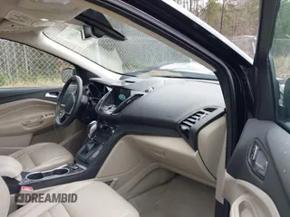 2016 Ford Escape Titanium with VIN 1FMCU9J91GUA59639, listed as a IAAI auction lot 41058369 with 138,046 mi miles. Bid and sale history available at carsss.com. Image 5.