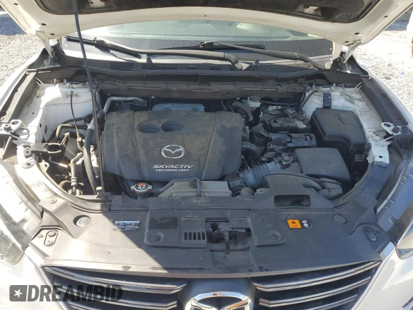 2016 Mazda CX-5 Grand Touring with VIN JM3KE4DY0G0819528, listed as a Copart auction lot 52343885 with 77,340 mi miles and Clean Title. Bid and sale history available at DreamBid. Image 12.