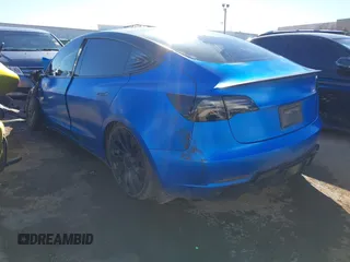 2022 Tesla Model 3 Performance z VIN 5YJ3E1EC9NF337945, wystawiony jako IAAI lot #41419561 z przebiegiem Nie podano mil oraz . Historia ofert i sprzedaży dostępna na DreamBid. Obrazek 3.