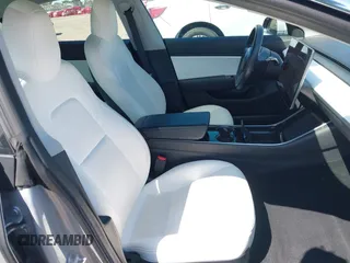 2018 Tesla Model 3 Long Range Battery with VIN 5YJ3E1EB5JF100578, listed as a IAAI auction lot 41959766 with 57,931 mi miles and . Bid and sale history available at DreamBid. Image 5.