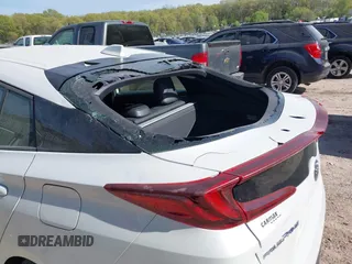 2022 Toyota Prius LE z VIN JTDKAMFP3N3202936, wystawiony jako IAAI lot #42238577 z przebiegiem 38 065 mil mil oraz . Historia ofert i sprzedaży dostępna na DreamBid. Obrazek 6.