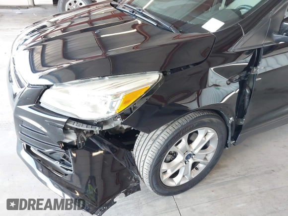 2015 Ford Escape Titanium with VIN 1FMCU0J98FUB95597, listed as a IAAI auction lot 41785188 with 84,141 mi miles. Bid and sale history available at carsss.com. Image 6.