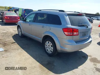 2016 Dodge Journey SE with VIN 3C4PDCAB1GT230387, listed as a IAAI auction lot 42106842 with 157,299 mi miles. Bid and sale history available at carsss.com. Image 3.