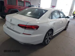 2021 Volkswagen Passat SE with VIN 1VWSA7A30MC014179, listed as a IAAI auction lot 42342358 with 77,535 mi miles and . Bid and sale history available at DreamBid. Image 4.