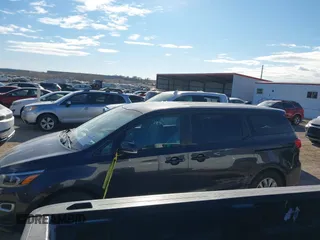 2021 Kia Sedona EX with VIN KNDMB5C19M6671229, listed as a IAAI auction lot 41066675 with 168,393 mi miles. Bid and sale history available at carsss.com. Image 14.