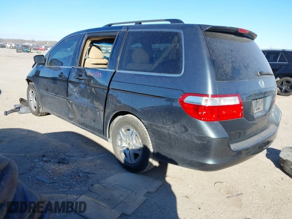 2005 Honda Odyssey EX with VIN 5FNRL38455B401141, listed as a IAAI auction lot 41407460 with 194,347 mi miles. Bid and sale history available at carsss.com. Image 3.