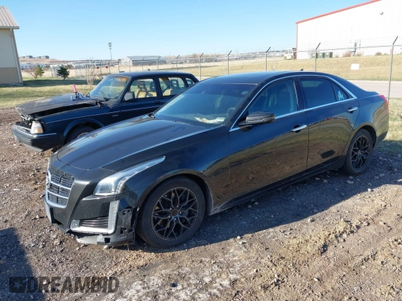 2014 Cadillac CTS Luxury AWD z VIN 1G6AX5SX9E0177017, wystawiony jako IAAI lot #42038429 z przebiegiem 113 656 mil mil oraz . Historia ofert i sprzedaży dostępna na DreamBid. Obrazek 2.