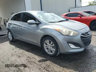 2014 Hyundai Elantra GT with VIN KMHD35LH8EU233076, listed as a Copart auction lot 54197065 with 116,871 mi miles and Salvage Title. Bid and sale history available at carsss.com. Image 4.