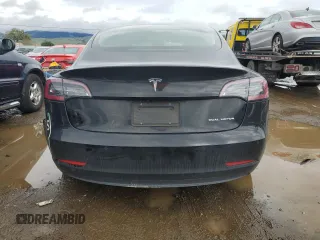 2019 Tesla Model 3 Long Range with VIN 5YJ3E1EB8KF384533, listed as a Copart auction lot 48557255 with 73,768 mi miles and Salvage Title. Bid and sale history available at carsss.com. Image 6.
