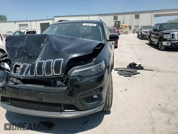2019 Jeep Cherokee Latitude Plus z VIN 1C4PJMLBXKD409716, wystawiony jako Copart lot #56367955 z przebiegiem 53 831 mil mil oraz Szkoda całkowita • Salvage title. Historia ofert i sprzedaży dostępna na DreamBid. Obrazek 13.