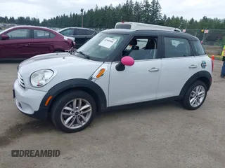 2014 MINI Countryman with VIN WMWZB3C5XEWR37594, listed as a IAAI auction lot 42500466 with 67,589 mi miles and . Bid and sale history available at DreamBid. Image 2.