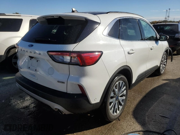 2020 Ford Escape Titanium Hybrid with VIN 1FMCU9DZ9LUC51915, listed as a Copart auction lot 77211074 with 40,170 mi miles and Salvage title. Bid and sale history available at DreamBid. Image 3.
