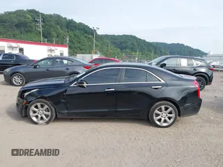 2014 Cadillac ATS Luxury AWD with VIN 1G6AH5RX2E0119821, listed as a IAAI auction lot 42670758 with 157,925 mi miles and . Bid and sale history available at DreamBid. Image 14.