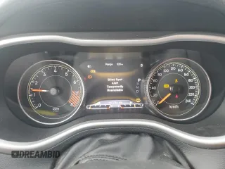 2015 Jeep Cherokee Trailhawk with VIN 1C4PJMBS0FW678738, listed as a Copart auction lot 50651235 with 147,793 mi miles and Salvage title. Bid and sale history available at DreamBid. Image 9.