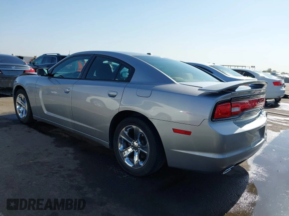 2013 Dodge Charger SE z VIN 2C3CDXBG0DH690682, wystawiony jako IAAI lot #42271976 z przebiegiem 161 176 mil mil oraz . Historia ofert i sprzedaży dostępna na DreamBid. Obrazek 3.