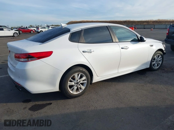 2016 Kia Optima LX with VIN 5XXGT4L34GG062691, listed as a IAAI auction lot 40743940 with 99,069 mi miles and . Bid and sale history available at DreamBid. Image 4.
