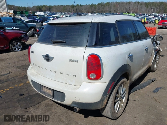 2014 MINI Countryman with VIN WMWZB3C52EWR42241, listed as a IAAI auction lot 41734963 with 121,325 mi miles and . Bid and sale history available at DreamBid. Image 4.