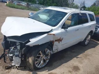 2014 Dodge Durango Citadel z VIN 1C4RDJEG9EC455930, wystawiony jako IAAI lot #42423167 z przebiegiem Nie podano mil oraz . Historia ofert i sprzedaży dostępna na DreamBid. Obrazek 2.