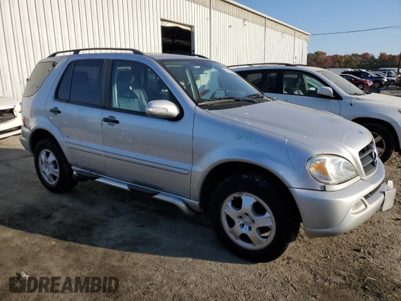 2002 Mercedes-Benz M-Class with VIN 4JGAB54E32A365833, listed as a Copart auction lot 76158434 with 175,244 mi miles and Salvage Title. Bid and sale history available at carsss.com. Image 4.
