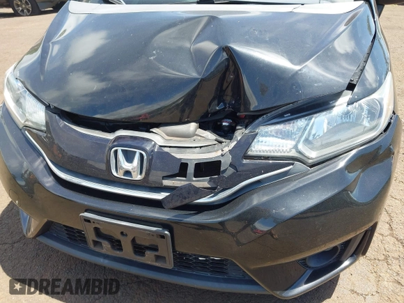 2015 Honda Fit EX-L with VIN 3HGGK5H89FM706018, listed as a IAAI auction lot 42417637 with 36,556 mi miles and . Bid and sale history available at DreamBid. Image 6.