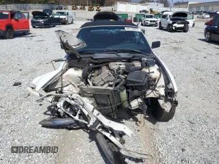 1995 BMW 3 Series 318iC with VIN WBABK6325SED18057, listed as a Copart auction lot 48123025 with 121,572 mi miles and Salvage Title. Bid and sale history available at carsss.com. Image 5.