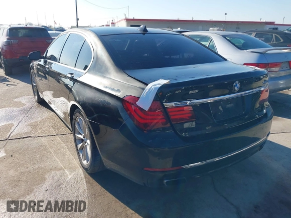2013 BMW 7 Series 740i with VIN WBAYA6C55DC995094, listed as a IAAI auction lot 41246796 with 164,394 mi miles. Bid and sale history available at carsss.com. Image 3.