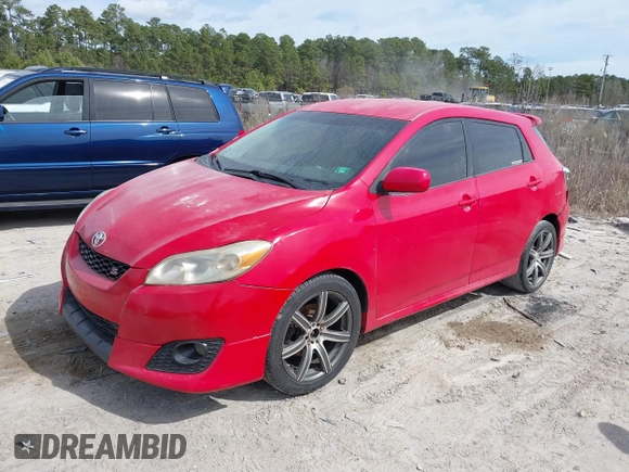 2009 Toyota Matrix S z VIN 2T1KE40E29C026440, wystawiony jako IAAI lot #41718124 z przebiegiem 148 546 mil mil oraz . Historia ofert i sprzedaży dostępna na DreamBid. Obrazek 2.