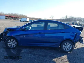 2015 Hyundai Accent GLS with VIN KMHCT4AE6FU916149, listed as a IAAI auction lot 41082268 with 153,219 mi miles. Bid and sale history available at carsss.com. Image 14.