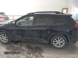 2016 Jeep Cherokee Altitude with VIN 1C4PJLAB6GW158704, listed as a IAAI auction lot 41635866 with 78,115 mi miles and . Bid and sale history available at DreamBid. Image 14.