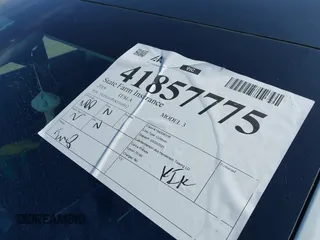 2019 Tesla Model 3 Long Range with VIN 5YJ3E1EB1KF510912, listed as a IAAI auction lot 41857775 with Not Provided miles and . Bid and sale history available at DreamBid. Image 19.