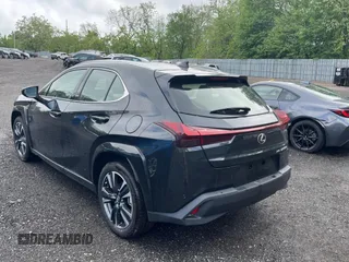 2025 Lexus UX 300h with VIN JTHUCJDH8S2003698, listed as a Copart auction lot 56182345 with 1,111 mi miles and Salvage Title. Bid and sale history available at DreamBid. Image 3.