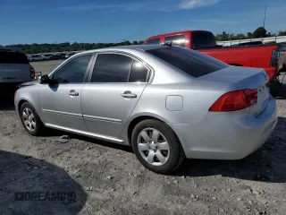 2010 Kia Optima LX z VIN KNAGG4A85A5407416, wystawiony jako Copart lot #71970634 z przebiegiem 194 869 mil mil oraz Szkoda całkowita • Salvage title. Historia ofert i sprzedaży dostępna na DreamBid. Obrazek 2.